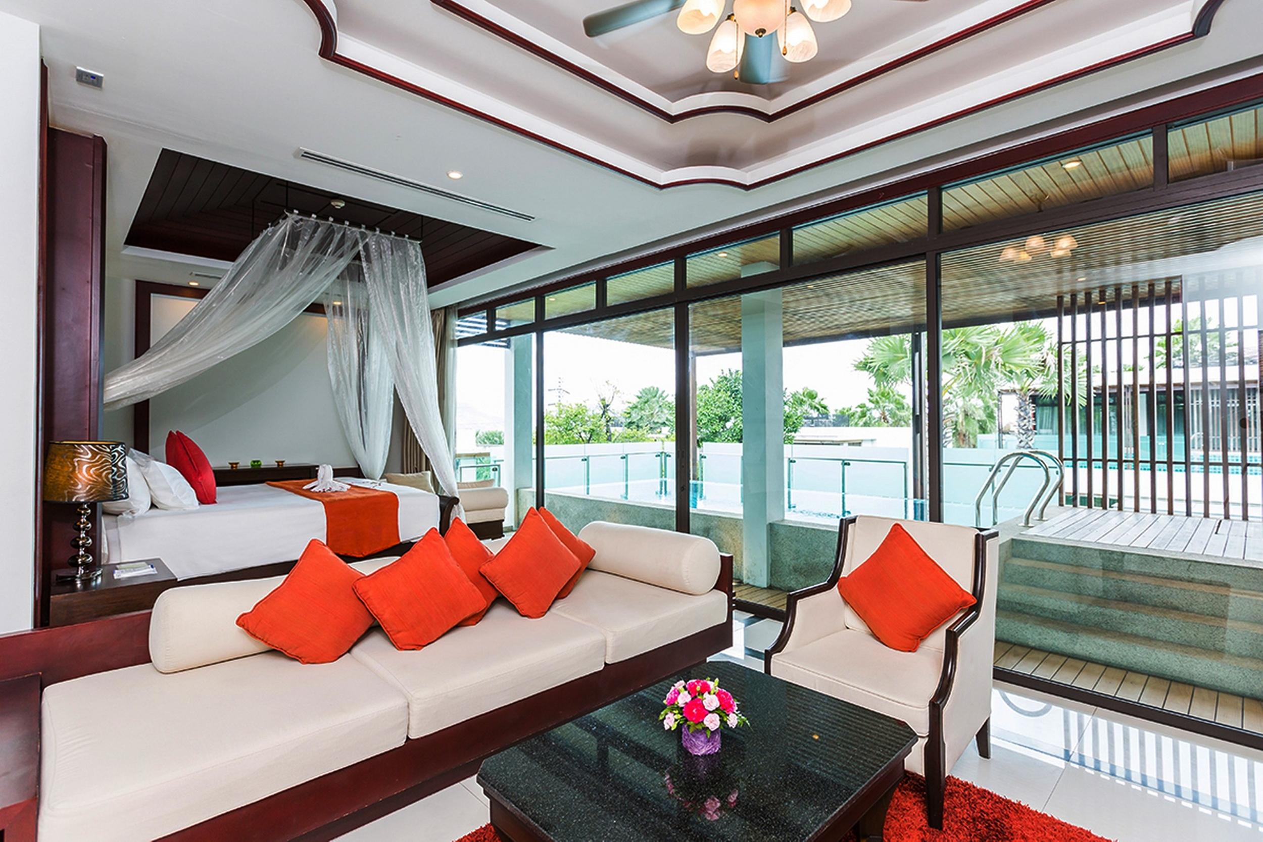Wyndham Sea Pearl Resort, Phuket Patong Exteriér fotografie A bedroom at the Royal River Boutique Hotel