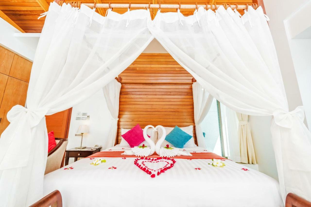 Wyndham Sea Pearl Resort, Phuket Patong Exteriér fotografie A bed with a canopy